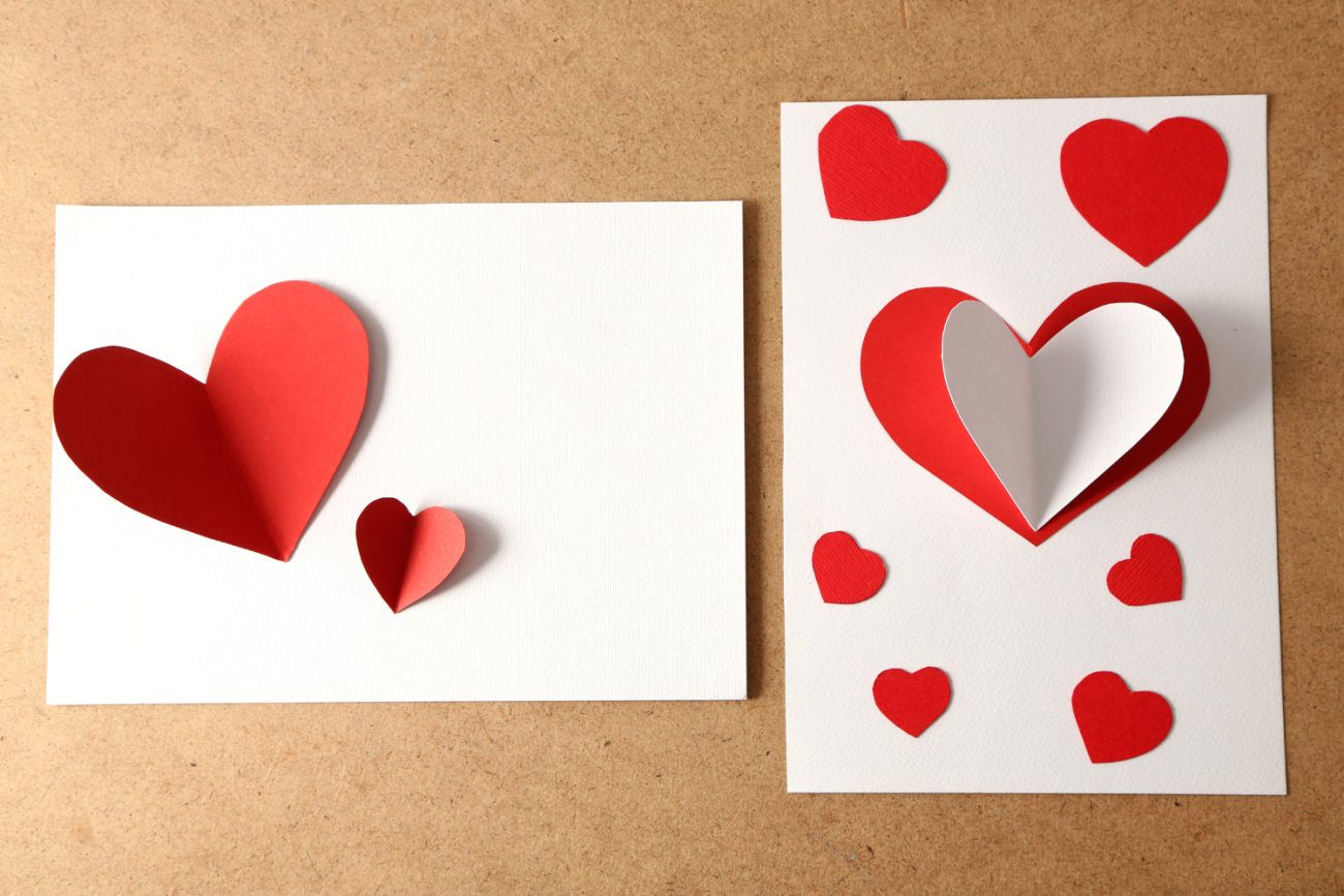 Red and white handmade card of hearts.